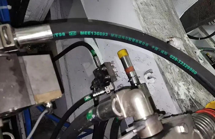 Crane Stability with Hose